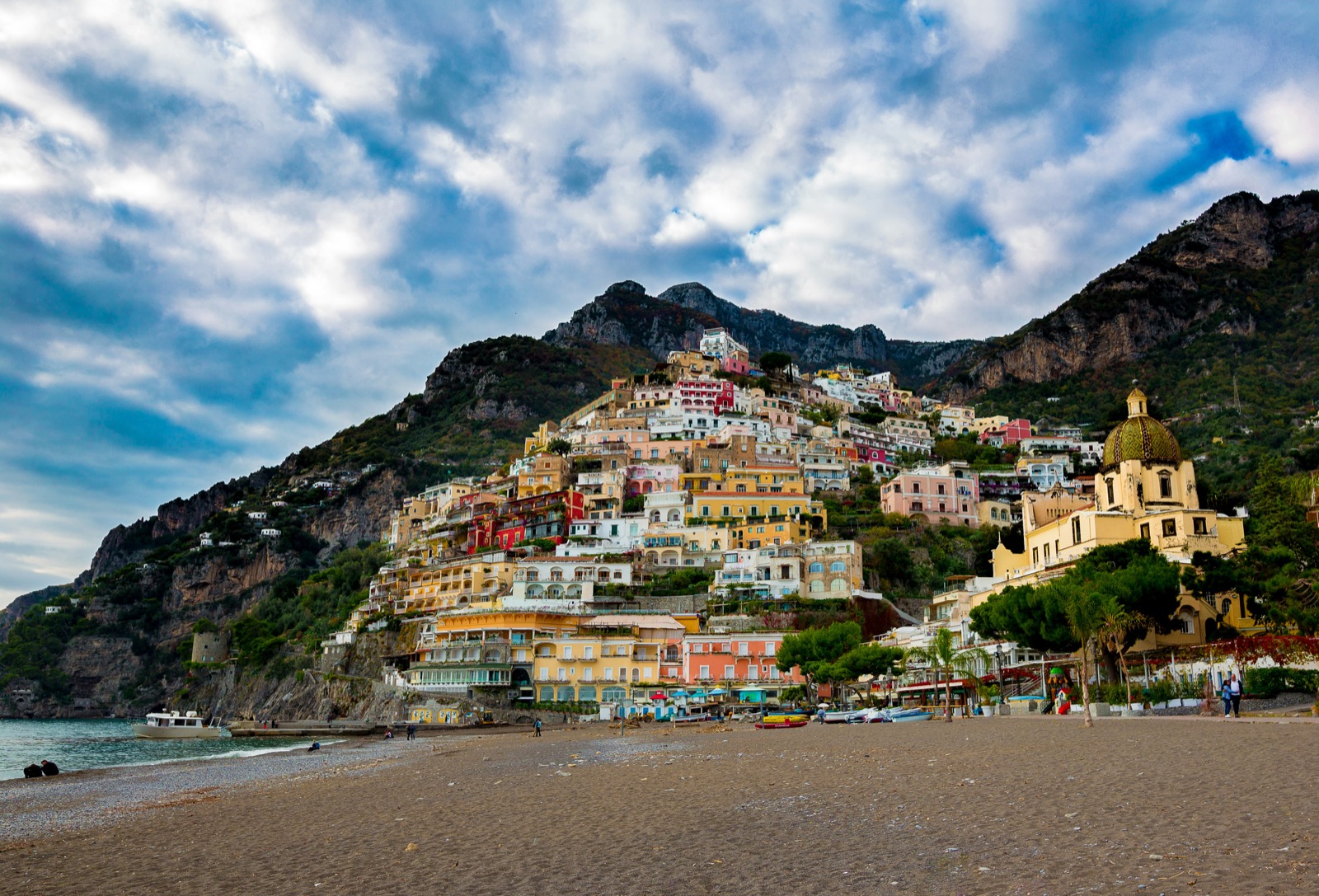 Colourful clifftop houses cascading toward the sea in Positano