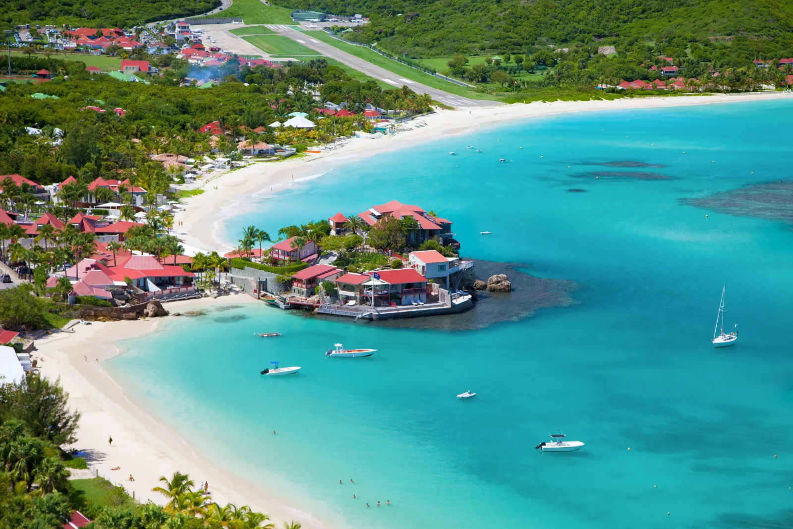 Aerial view of the Eden Rock resort on its promontory dividing St Jean beach, St. Barts